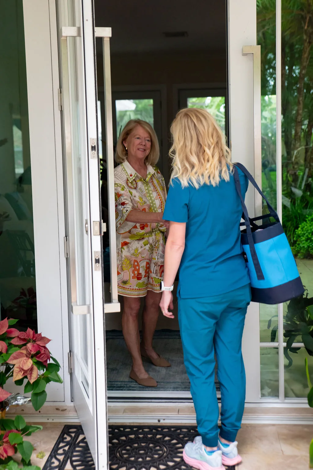 Dr. Katie arriving at a family's home for a visit